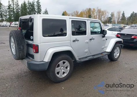 2011 Jeep Wrangler Unlimited Sahara из США, поврежденный, VIN 1J4BA5H14BL521928